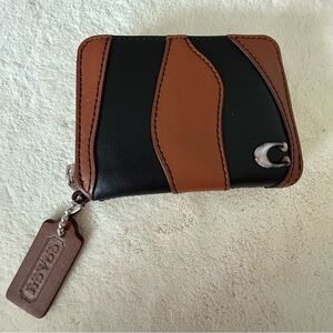 Coach Coachtopia Black and Tan Wallet with Logo Charm